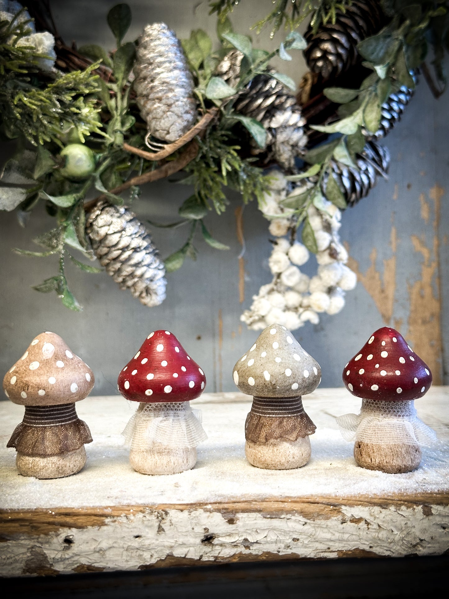 A wooden hand painted and trimmed Christmas village toadstool large pointy one