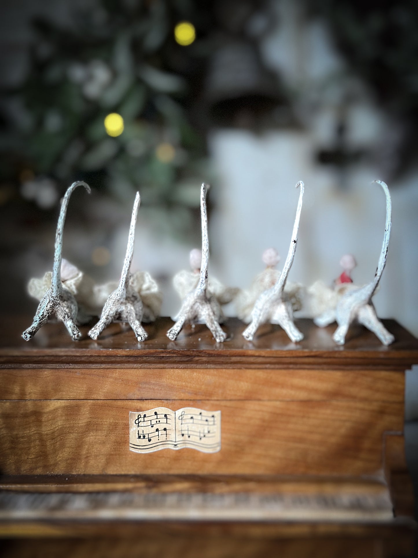 A cold painted brass “night before Christmas mouse” with a lace ruffle and Christmas hat