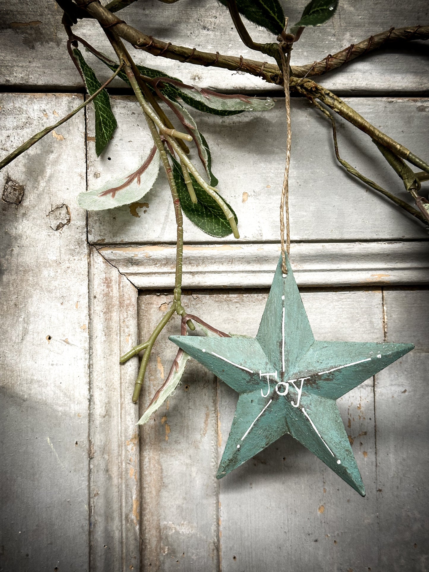 A Large Turquoise Tin Barn Star Christmas Decoration “Joy”