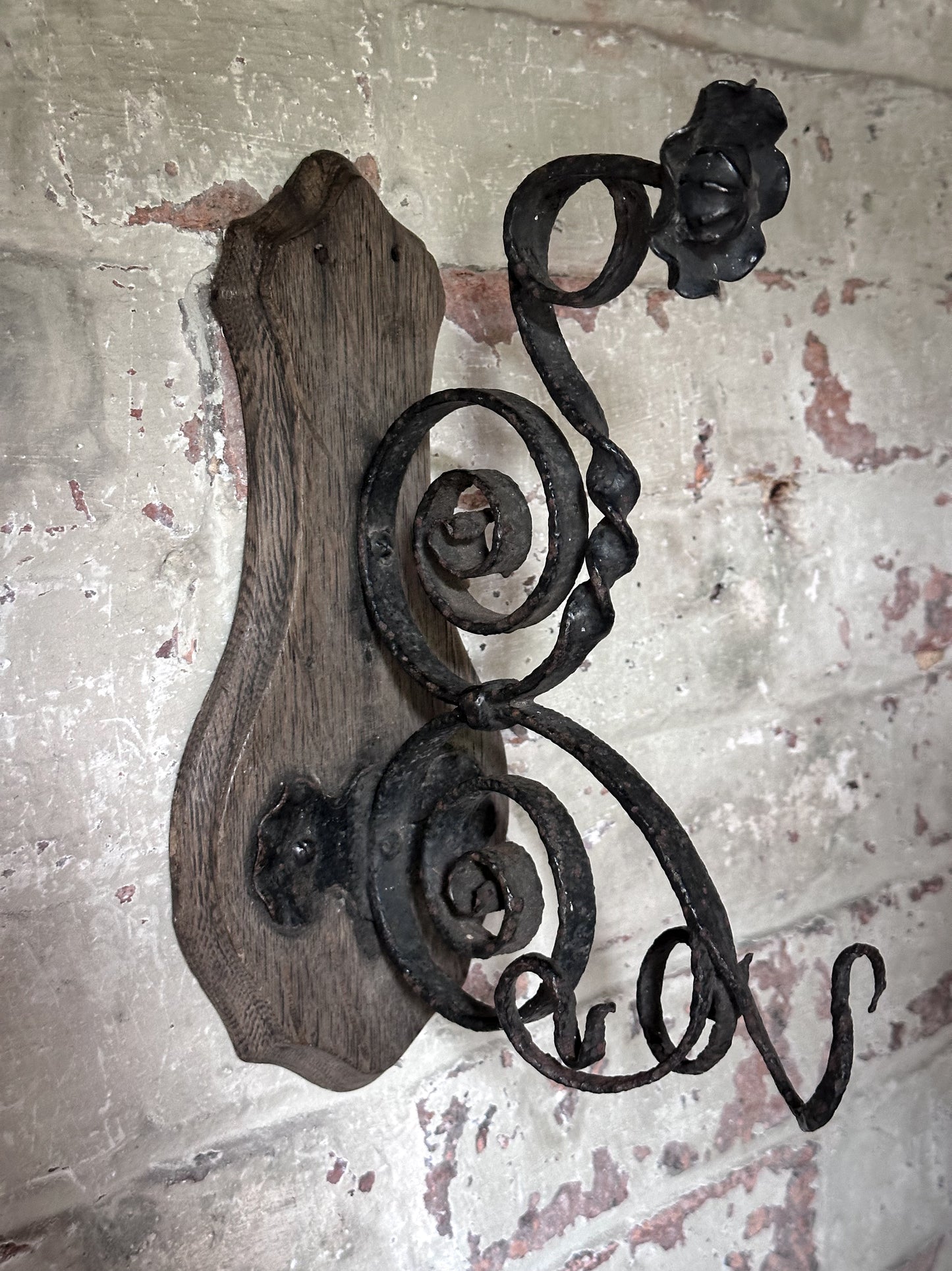 Antique Hand-Forged Wrought Iron Wall Bracket | Folk Art Scrollwork Hook on Wooden Backplate