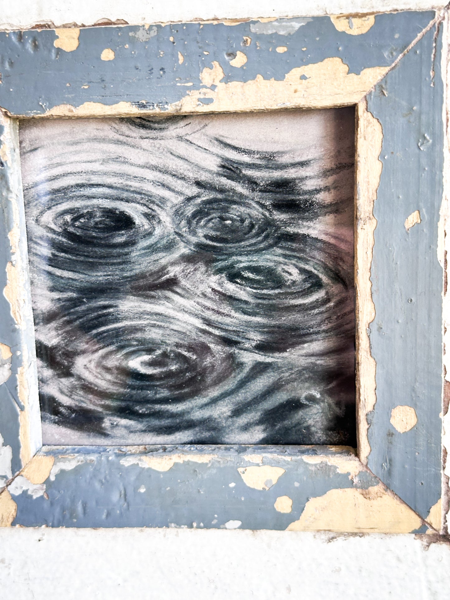 An original artwork by Steven Nicholas “Ripples in a Puddle”