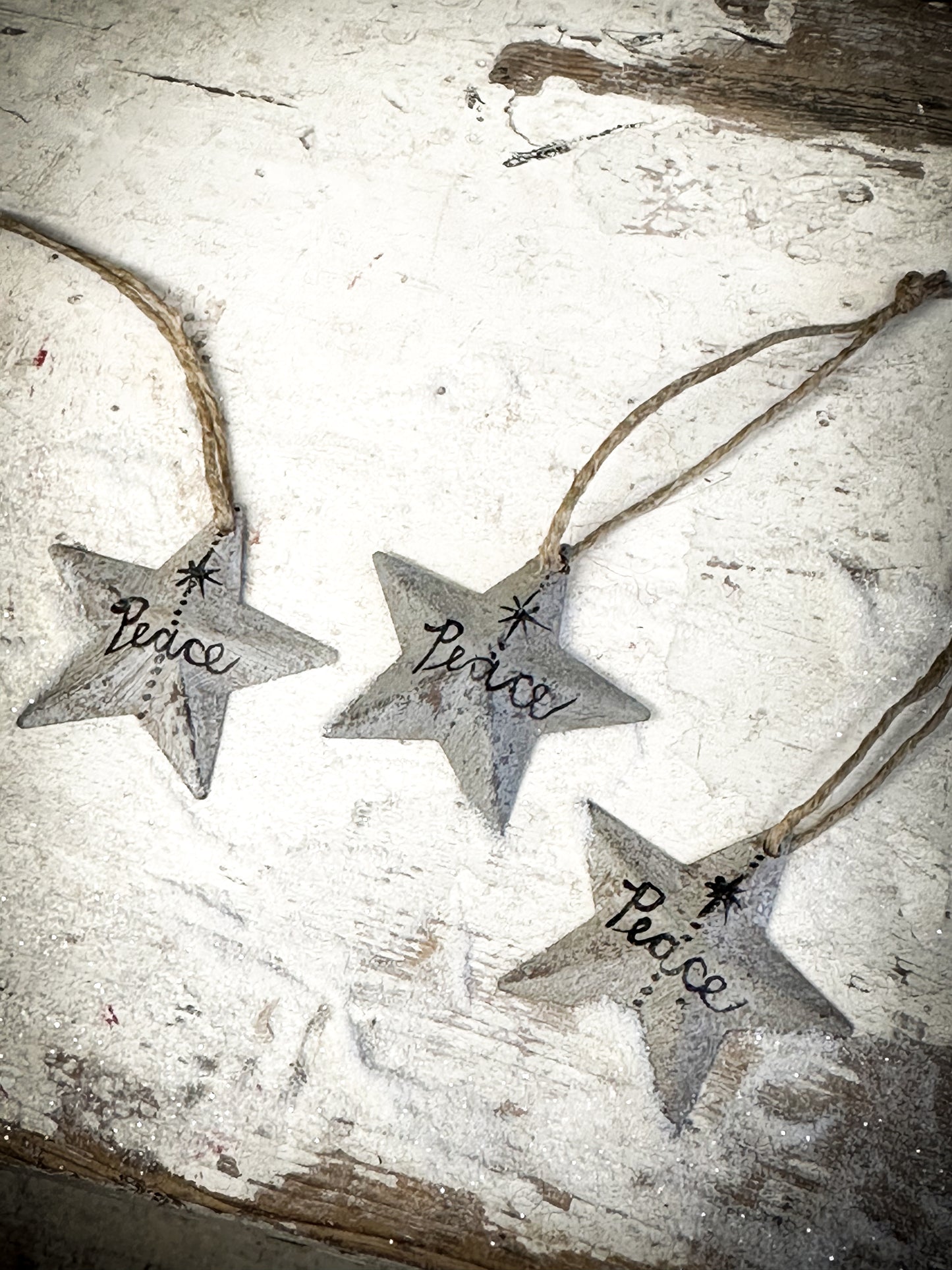 A Mini Grey Tin Barn Star Christmas Decoration “Peace”