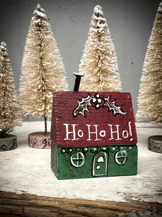 A small Vintage German Erzgebirge Putz Wooden Village House “Ho Ho Ho”