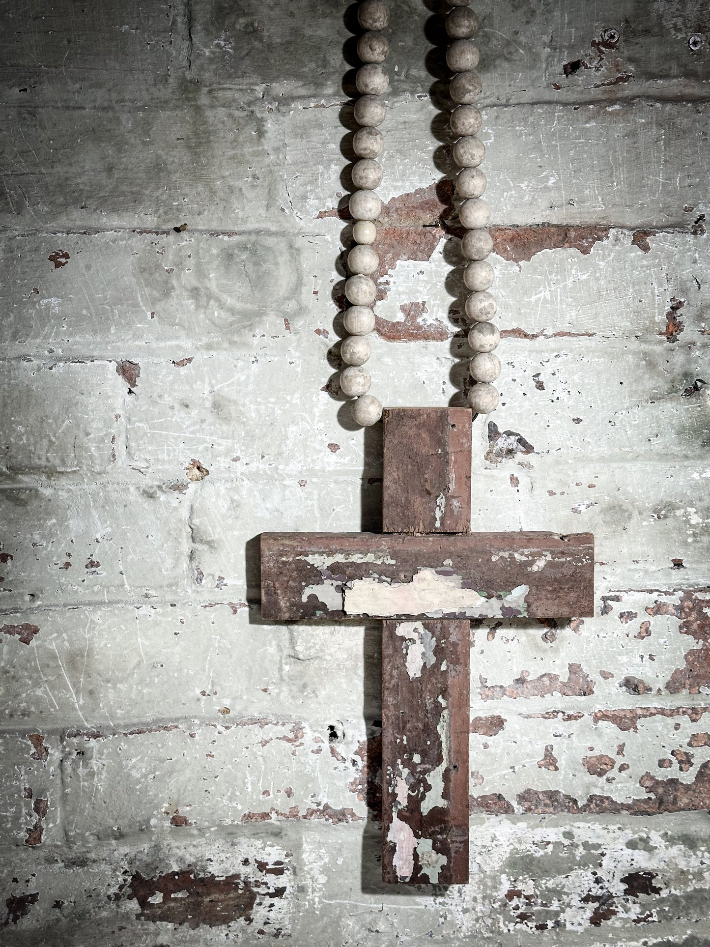 A beautiful hand made recycled wooden oversized crucifix or rosary