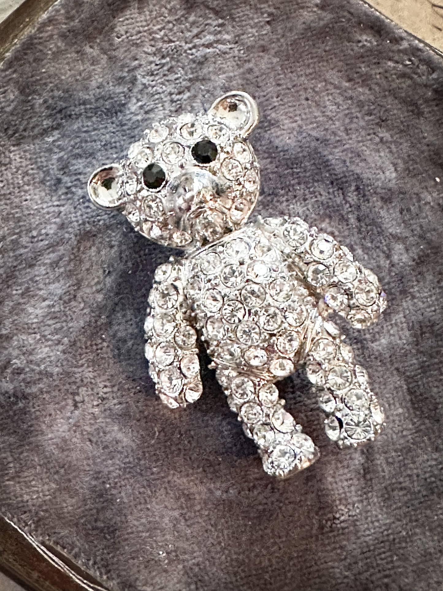 A sweet vintage diamanté teddy bear brooch