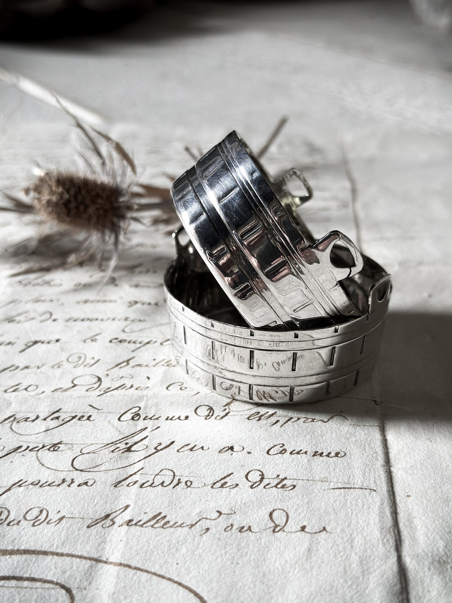 A pair of pretty silver plated mini churns