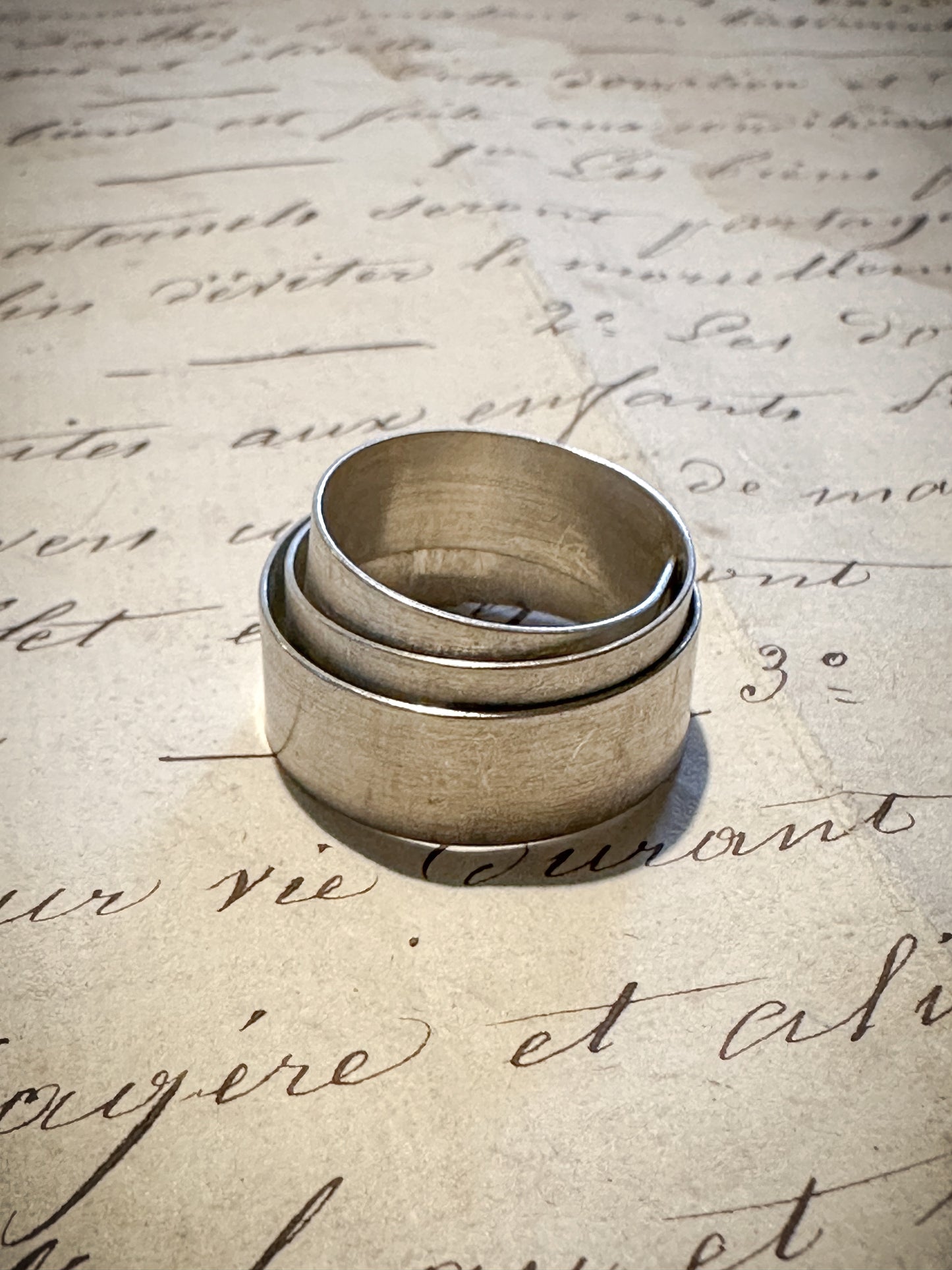 Striking brushed silver modernist wrap cuff ring