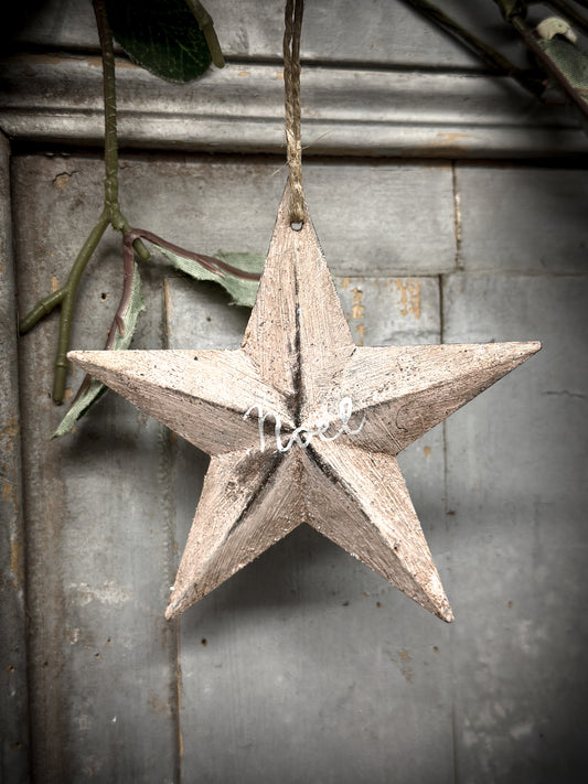 A Large Pale Pink Tin Barn Star Christmas Decoration “Noël”