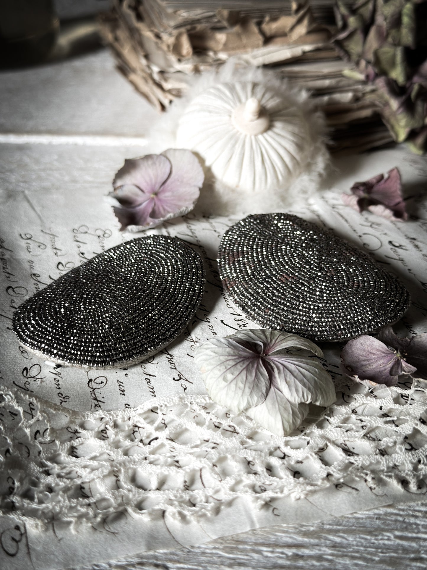 A pair of Victorian cut steel oval shoe buckles