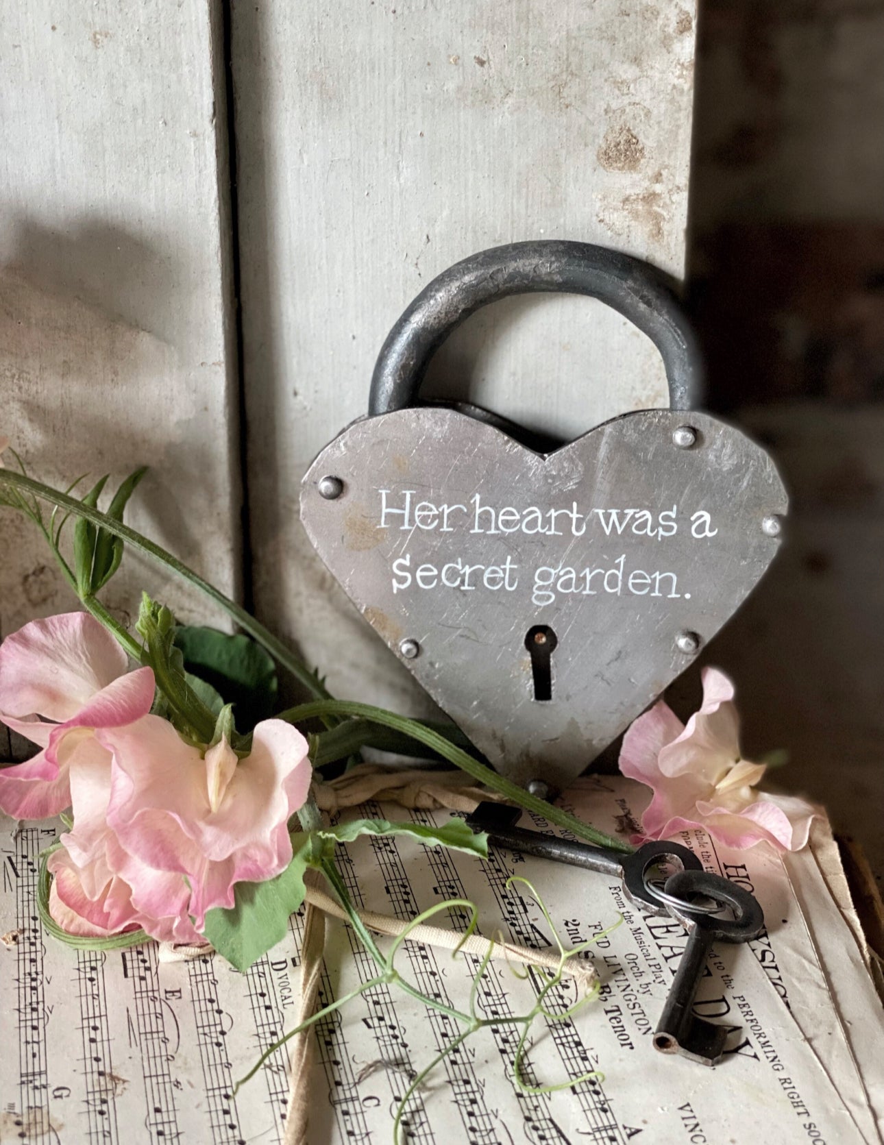 A beautiful hand painted rustic heart iron padlock with keys  "Her heart was a secret garden." A unique Valentine’s Day gift