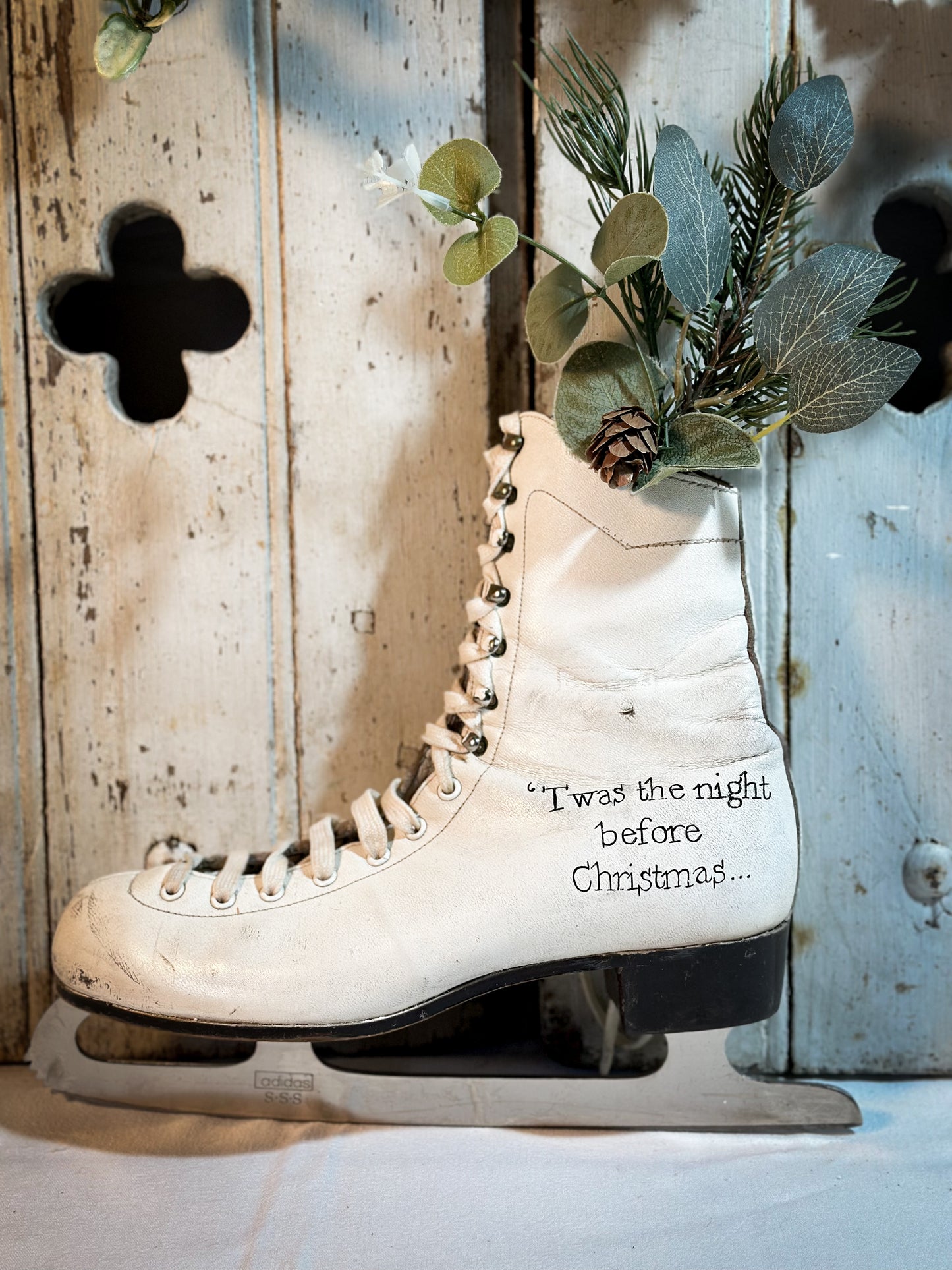 A beautiful vintage Christmas ice skate hand painted using traditional sign writer’s techniques and materials