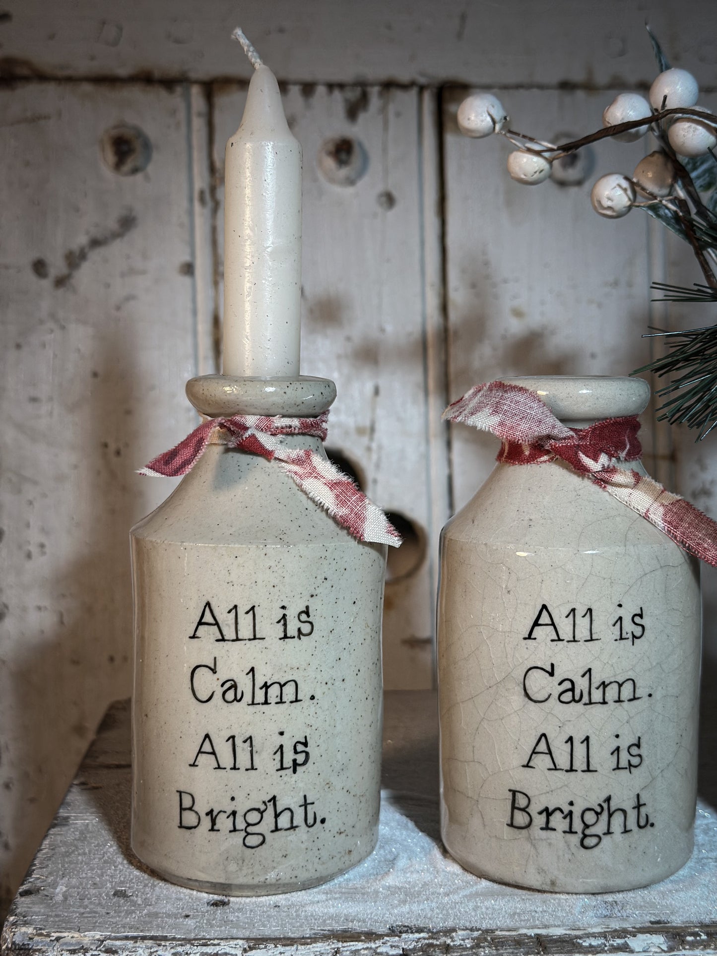 A Victorian unearthed stoneware pottery bottle with a hand painted quote