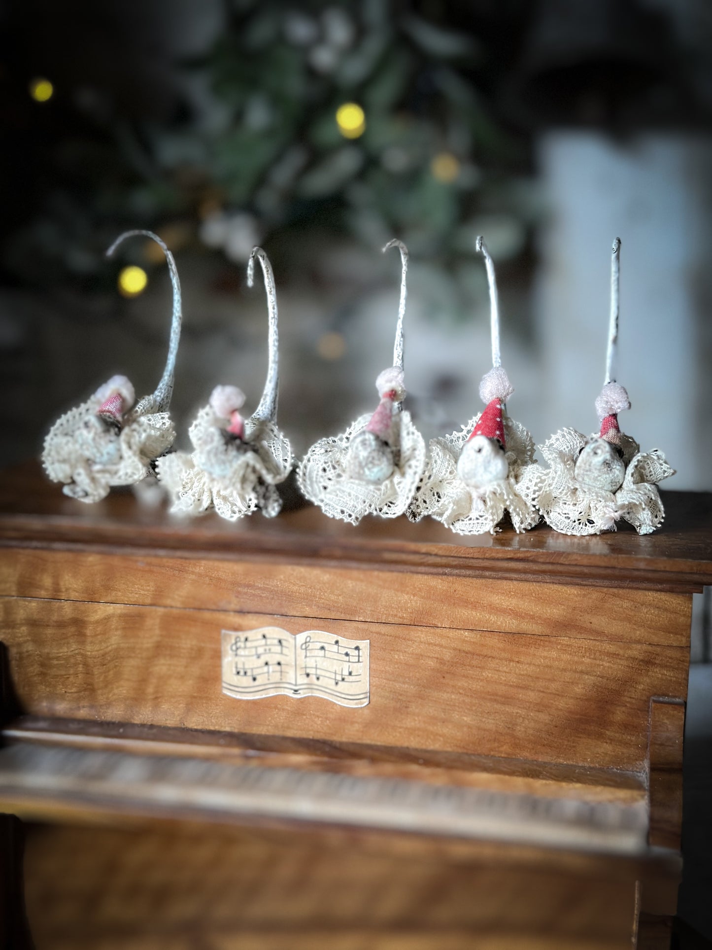 A cold painted brass “night before Christmas mouse” with a lace ruffle and Christmas hat