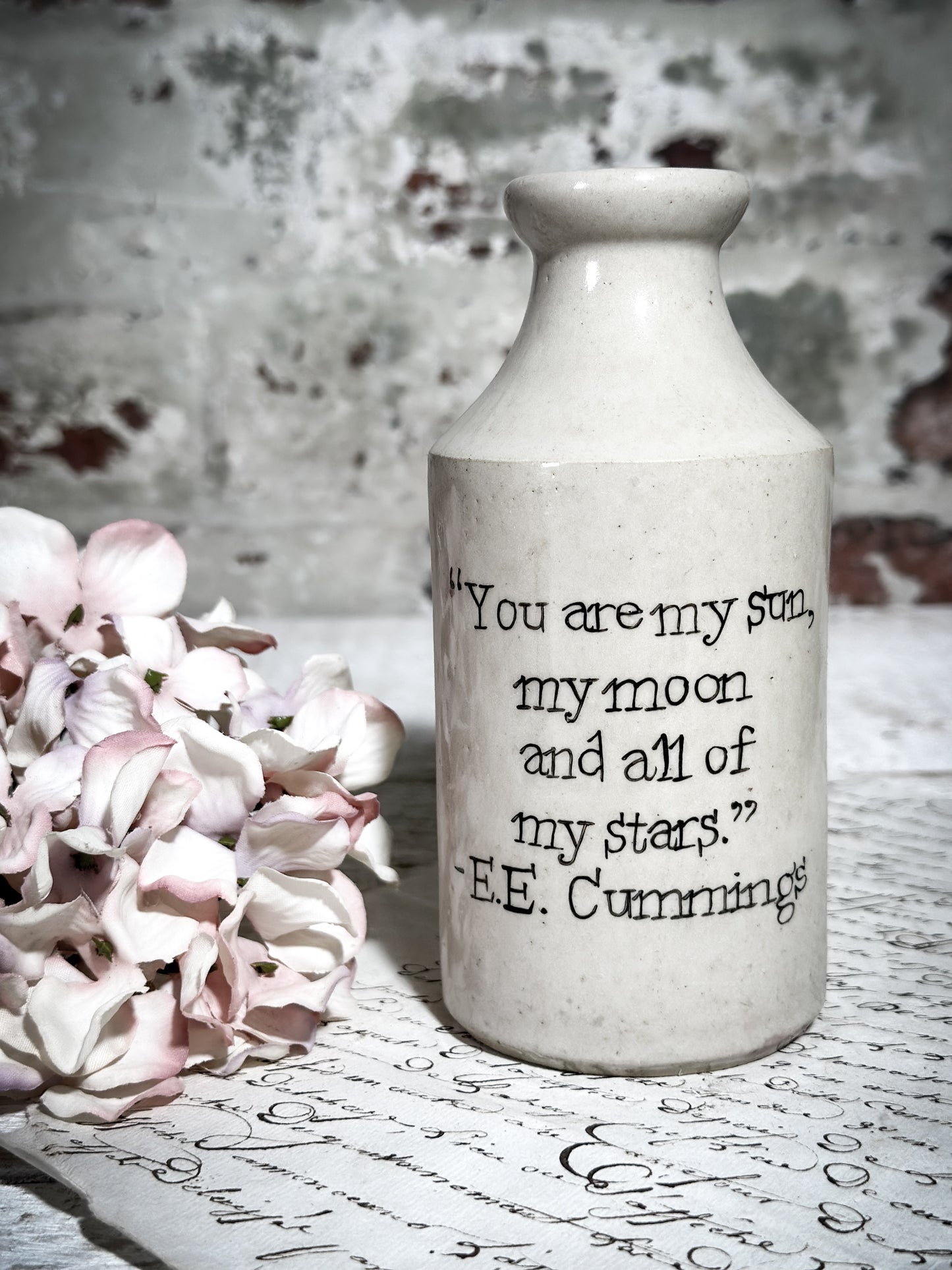 An Antique Pottery Bottle with a Hand Painted Valentine’s Day Quote