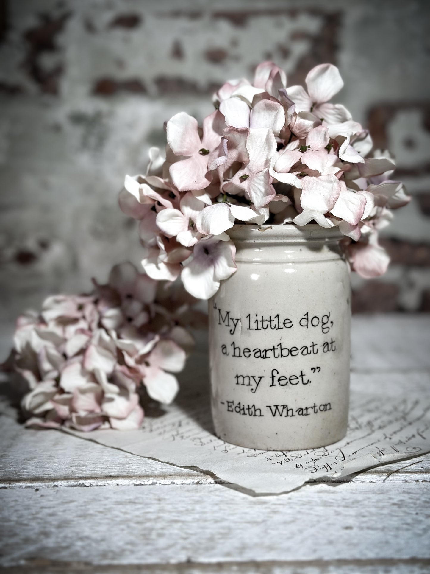 An Antique Jar with a Hand Painted Inspirational Quote