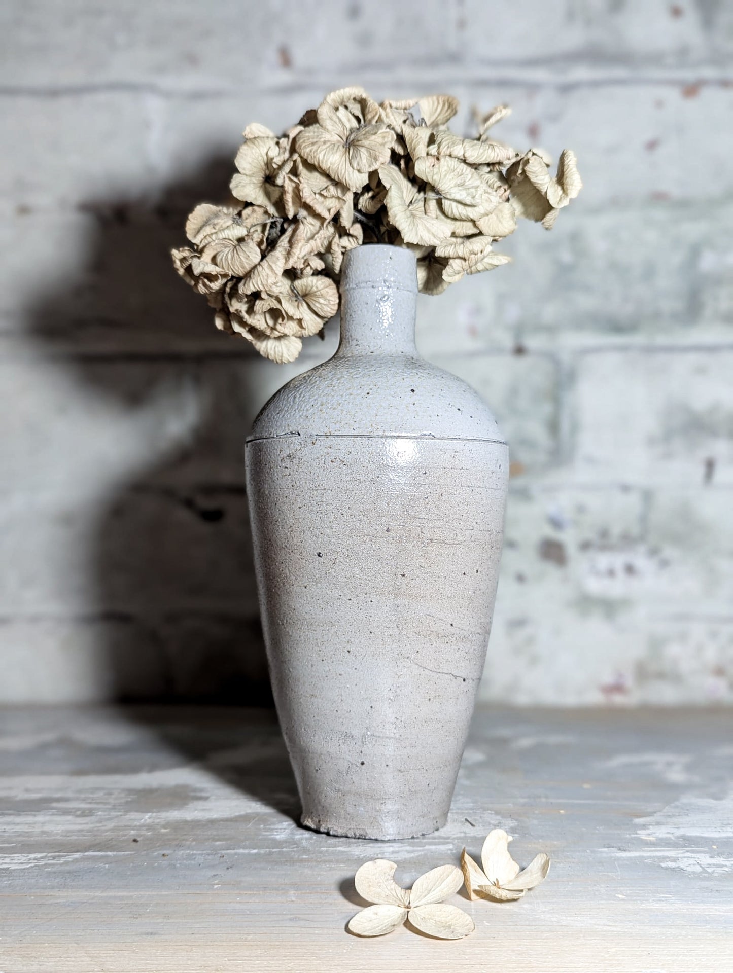 A lovely Primitive French Antique White Pottery bottle