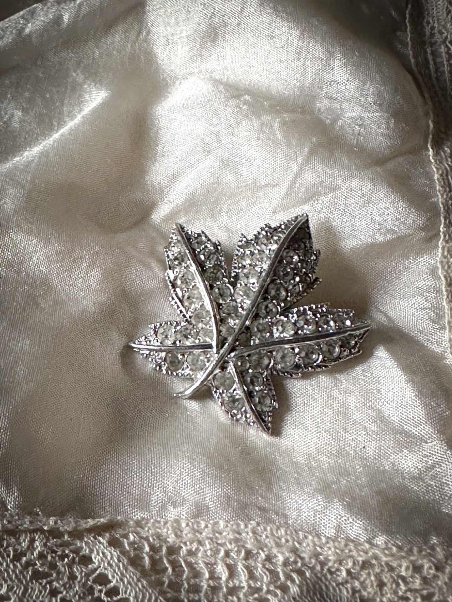 Vintage diamanté maple leaf brooch signed Keyes