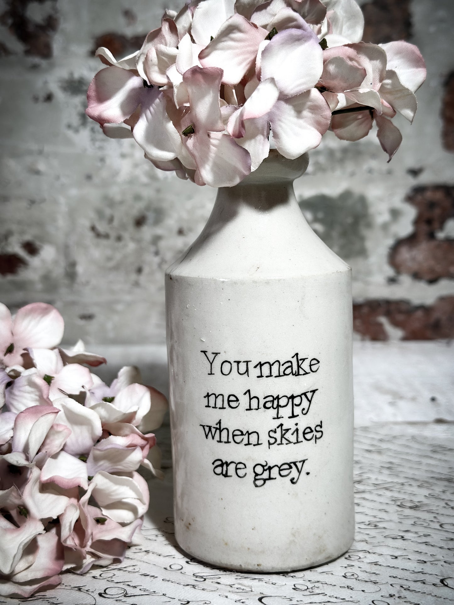 An Antique Pottery Bottle with a Hand Painted Valentine’s Day Quote