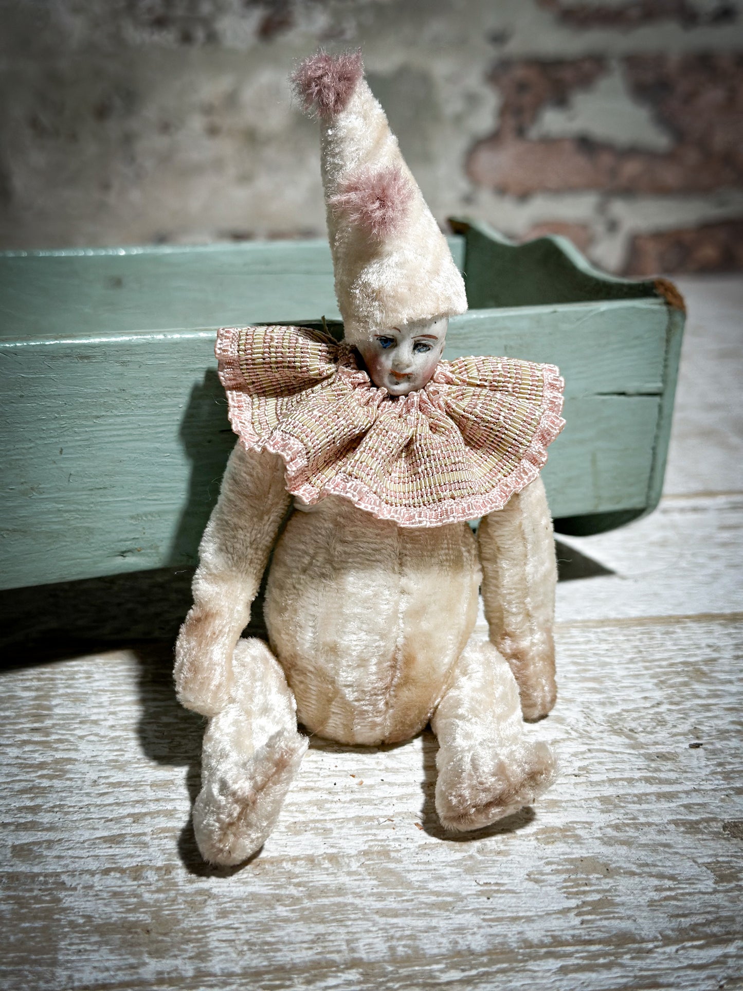 A beautiful hand made jointed collector’s doll teddy bear with bunny pyjamas