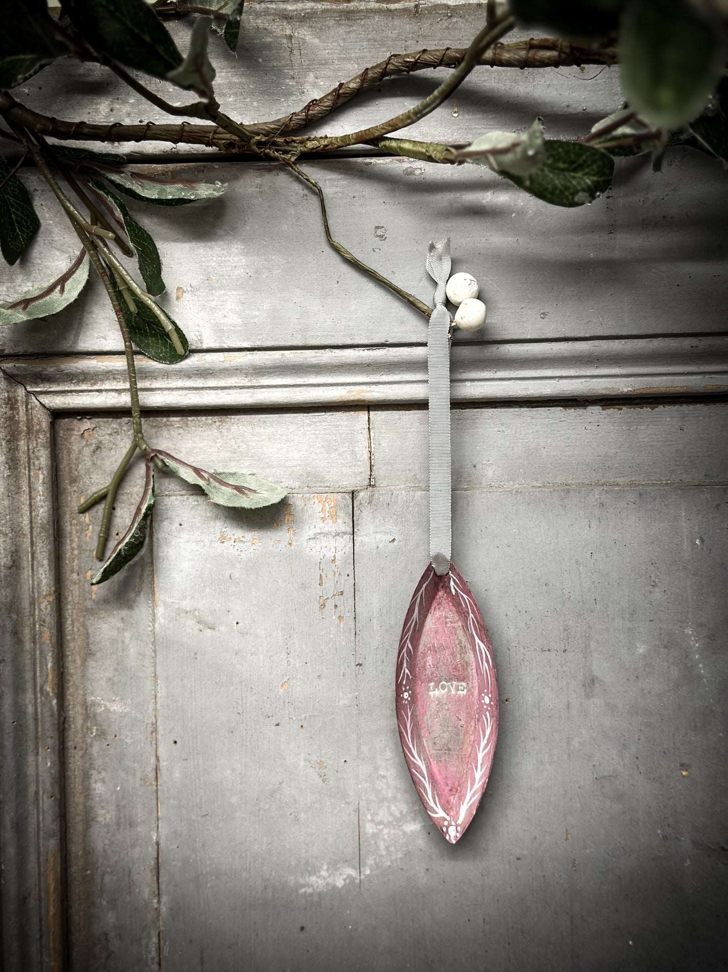 A Reworked French Patisserie Tin Christmas Decoration Stamped and Painted “love”