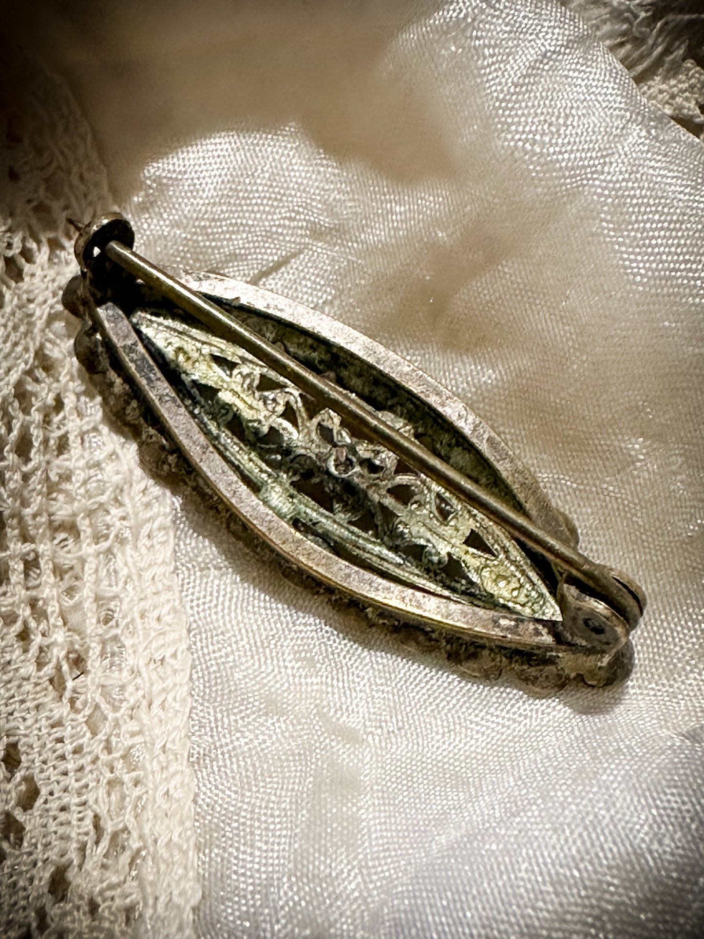 A stunning Iris glass oval sweetheart brooch