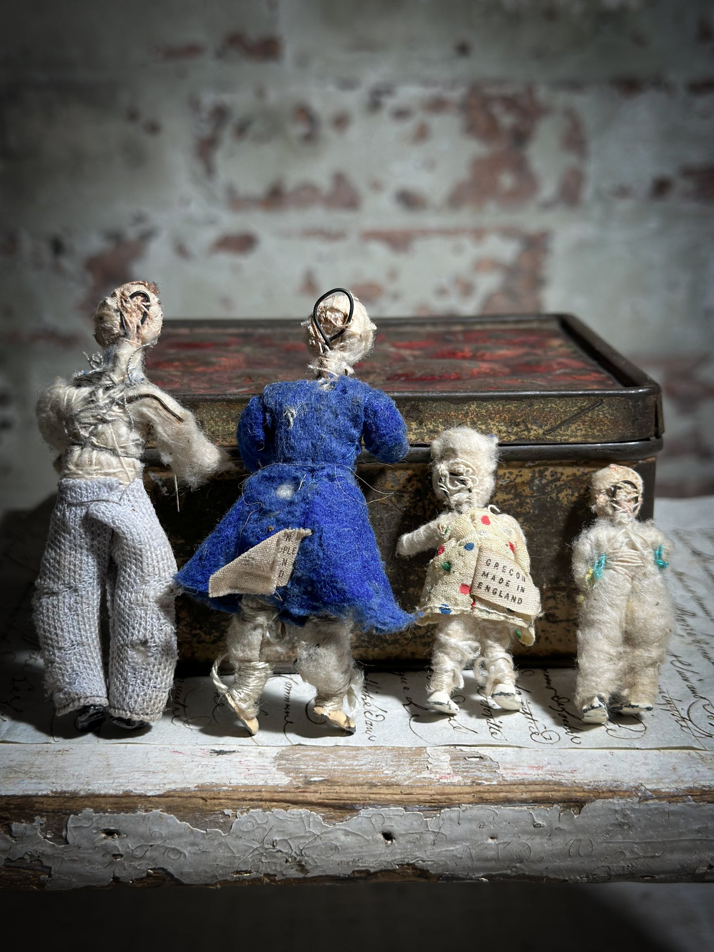 A family of 1930’s Doll’s house toy dolls by Drecon