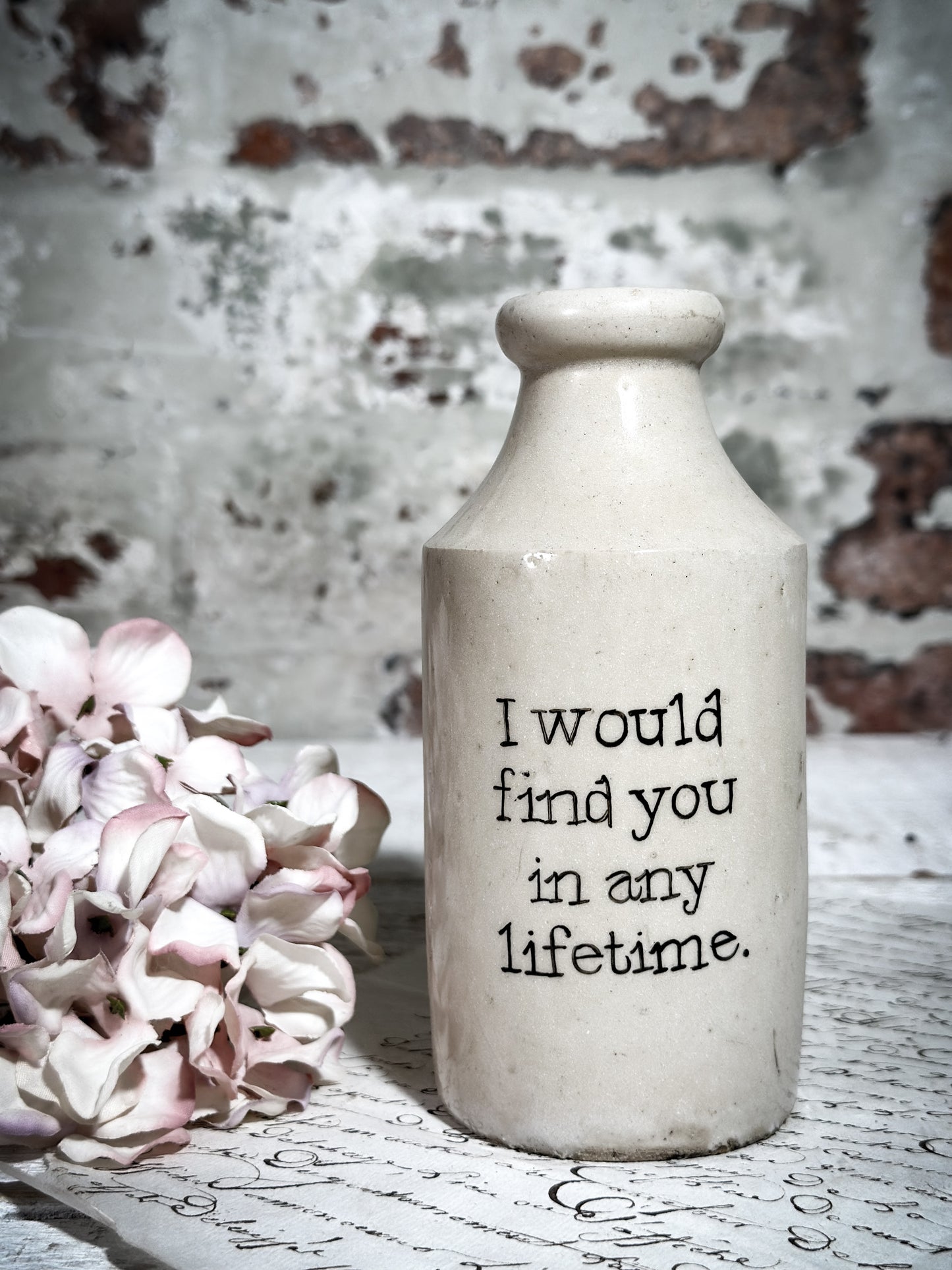 An Antique Pottery Bottle with a Hand Painted Valentine’s Day Quote