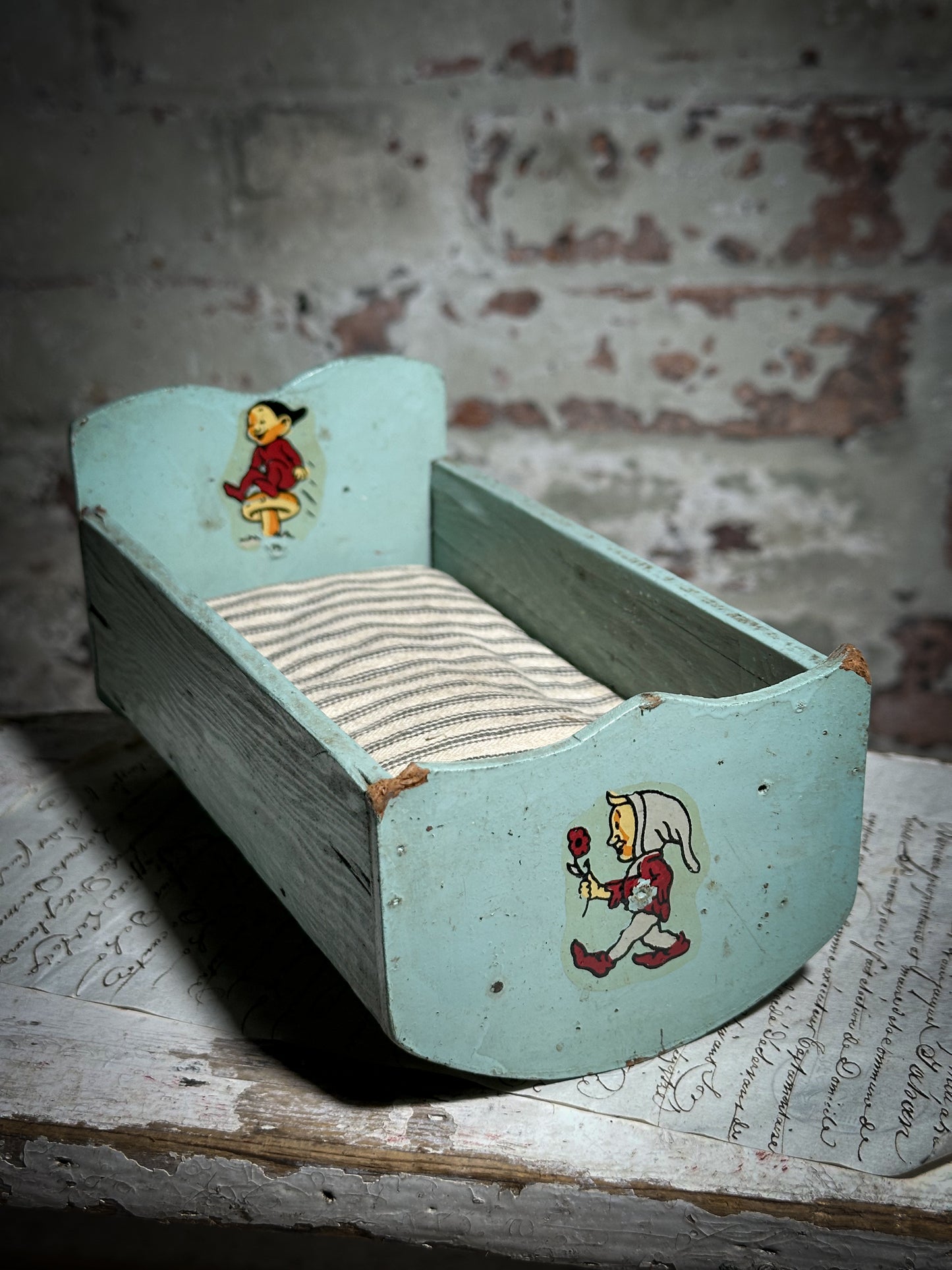 Vintage doll cradle with French ticking mattress