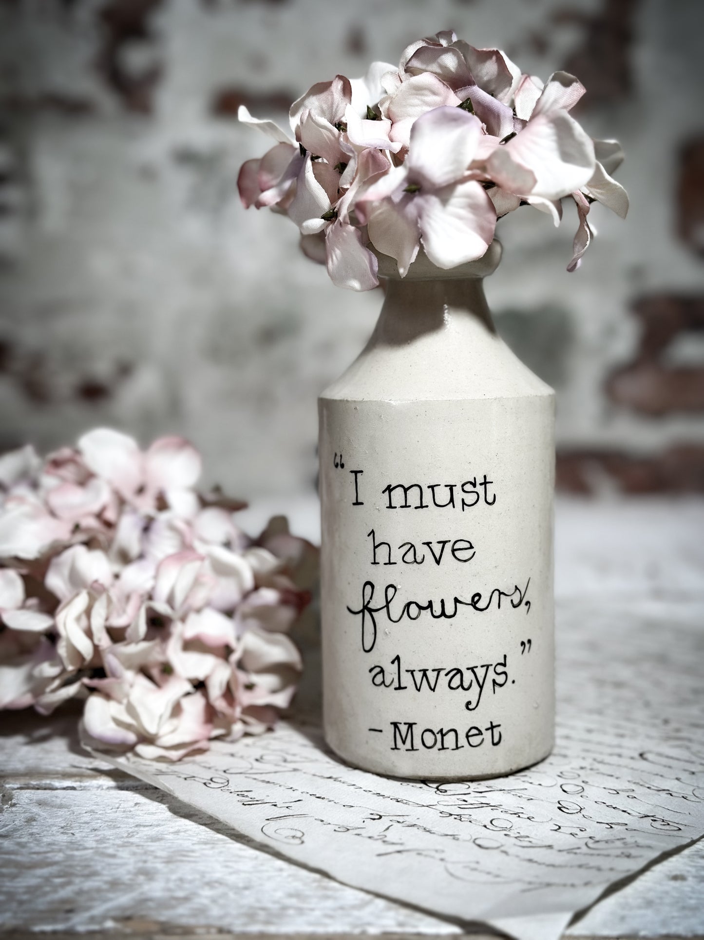 An Antique Pottery Bottle with a Hand Painted Inspirational Quote