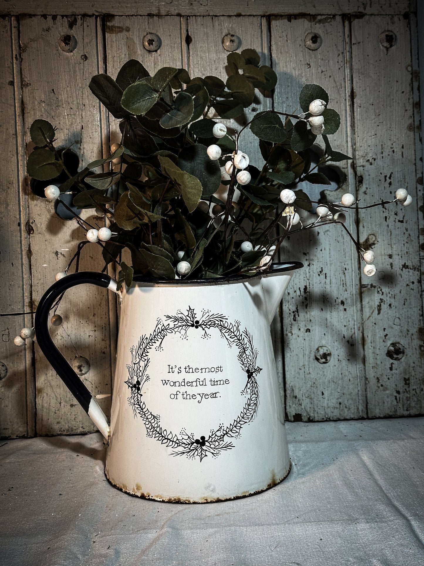 A hand painted quote on a beautiful Vintage white enamelware jug