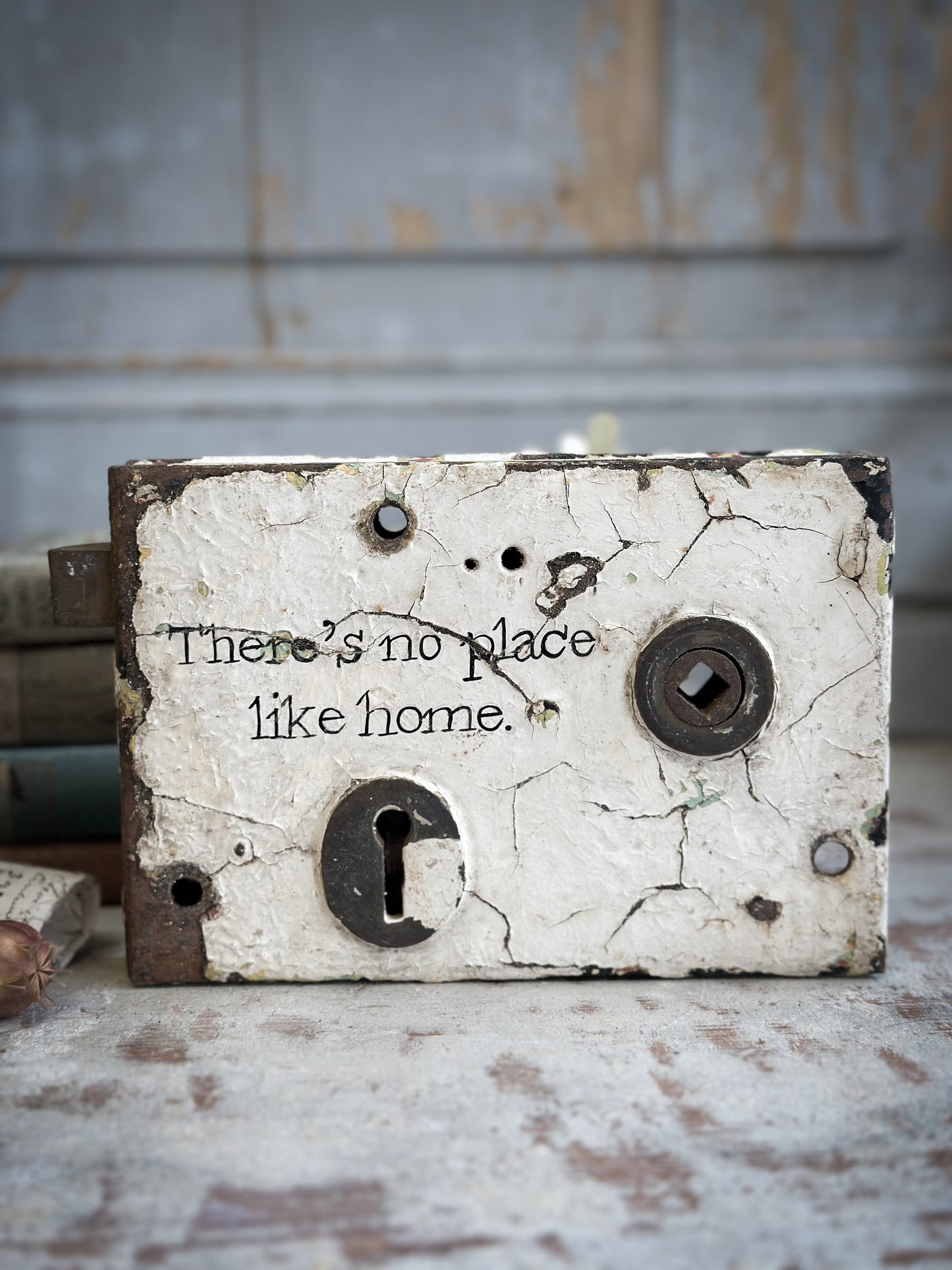 An Antique Lock With Hand Painted Quote