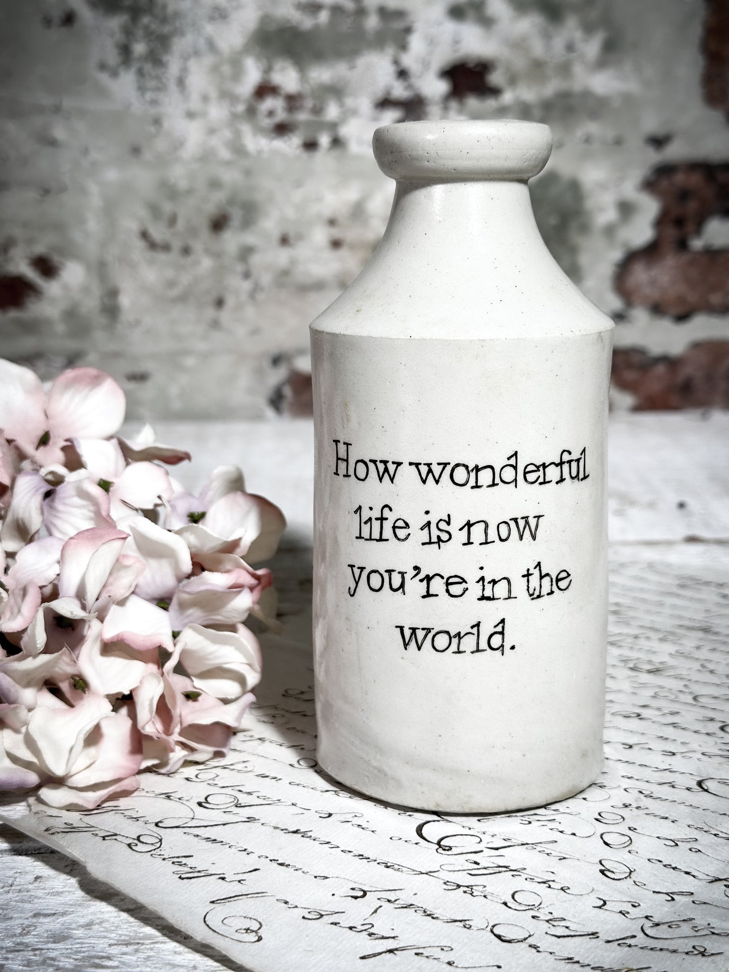 An Antique Pottery Bottle with a Hand Painted Valentine’s Day Quote