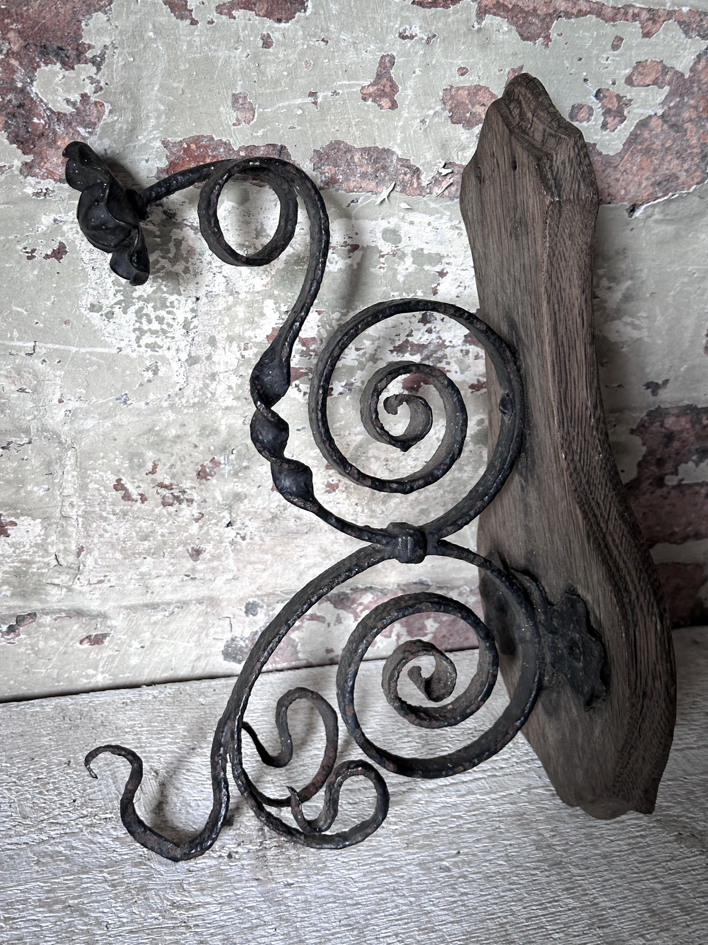 Antique Hand-Forged Wrought Iron Wall Bracket | Folk Art Scrollwork Hook on Wooden Backplate