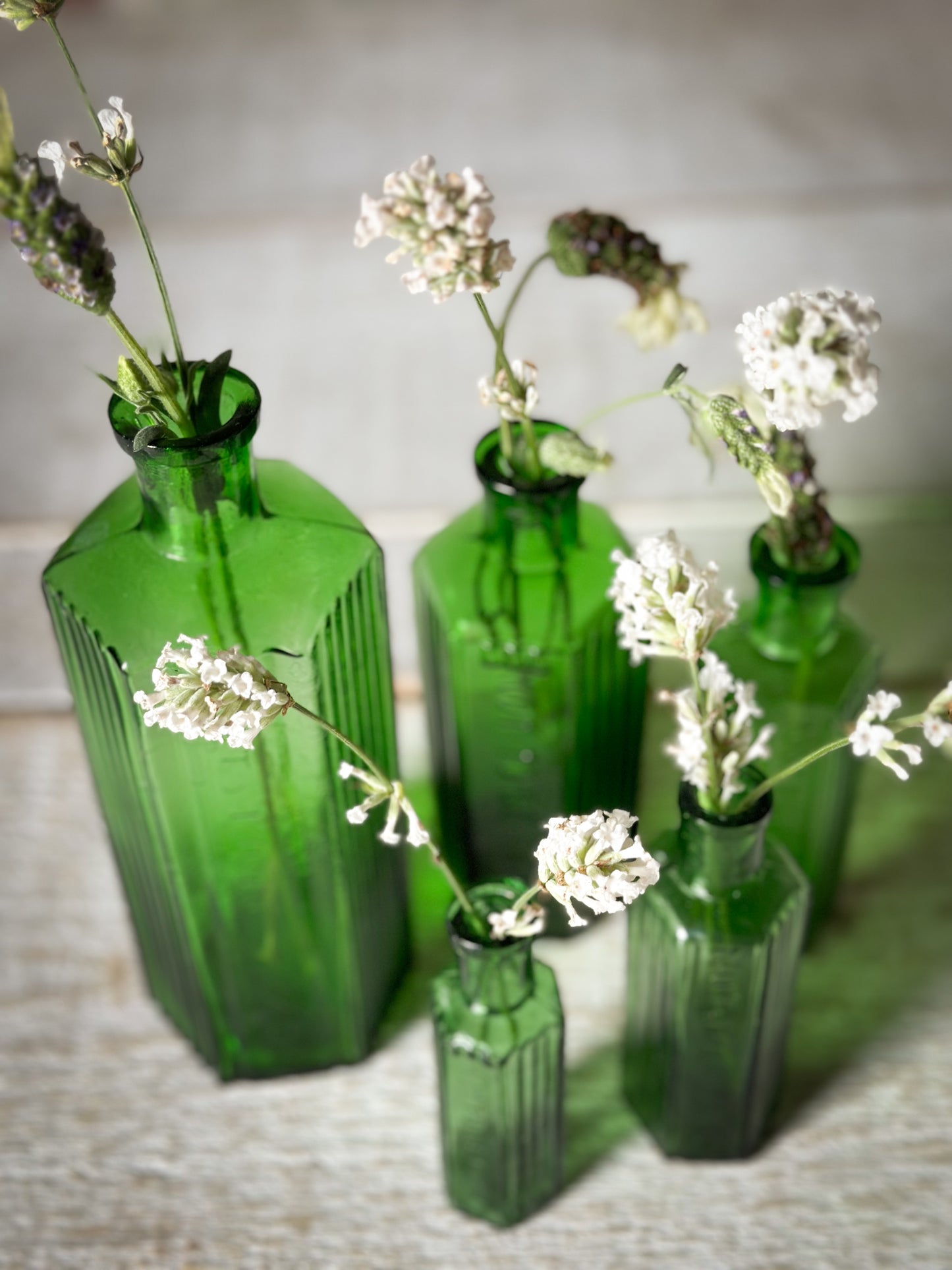 A set of Five lovely antique green poison bottles