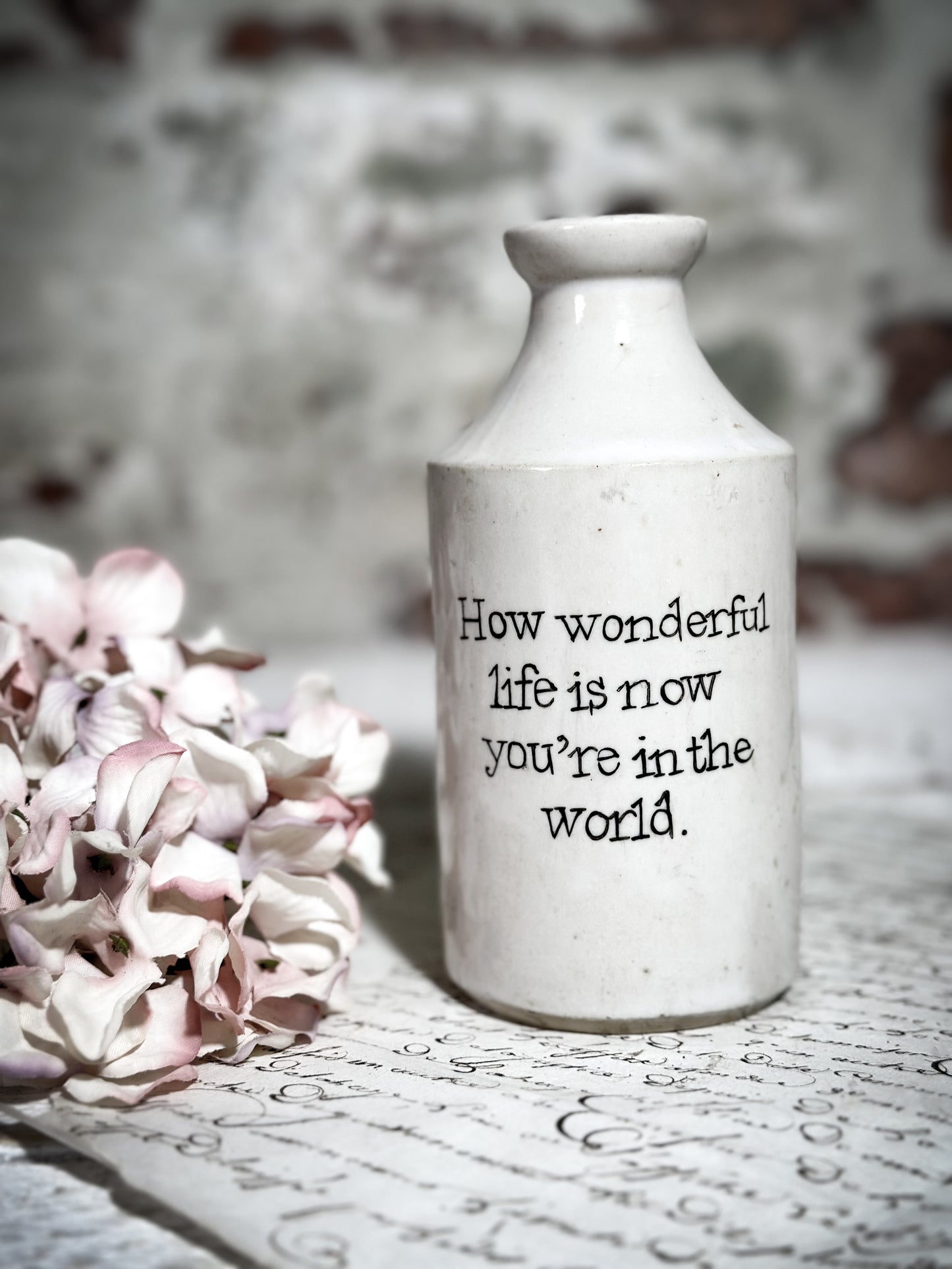 An Antique Pottery Bottle with a Hand Painted Valentine’s Day Quote