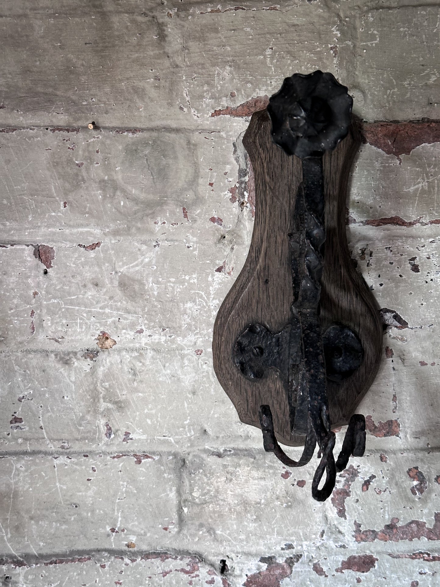 Antique Hand-Forged Wrought Iron Wall Bracket | Folk Art Scrollwork Hook on Wooden Backplate