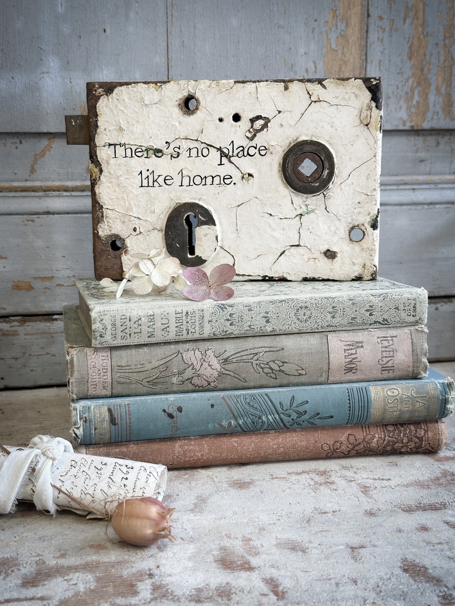 An Antique Lock With Hand Painted Quote