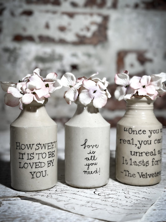 An Antique Bottle with a Hand Painted Inspirational Quote