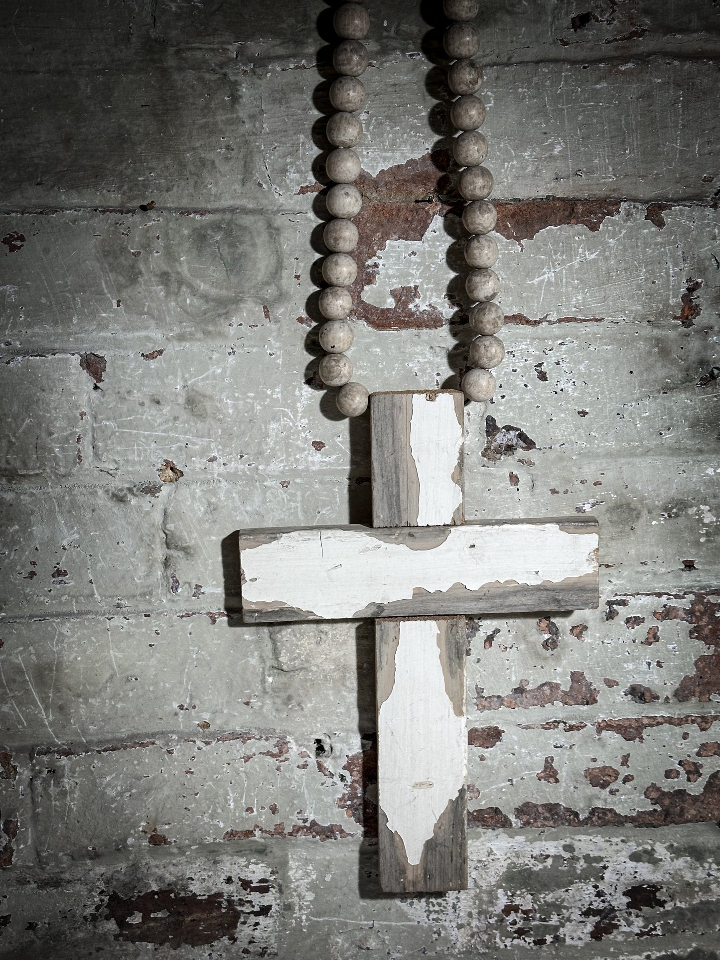 A beautiful hand made recycled wooden oversized crucifix or rosary