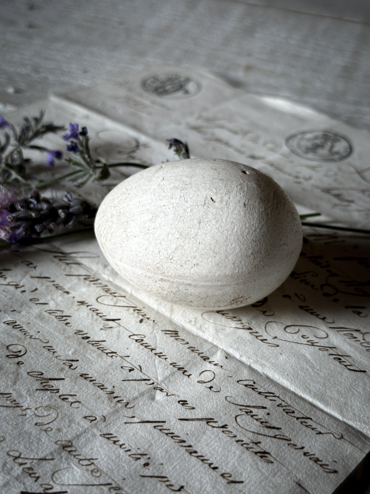 An original antique ceramic broody egg