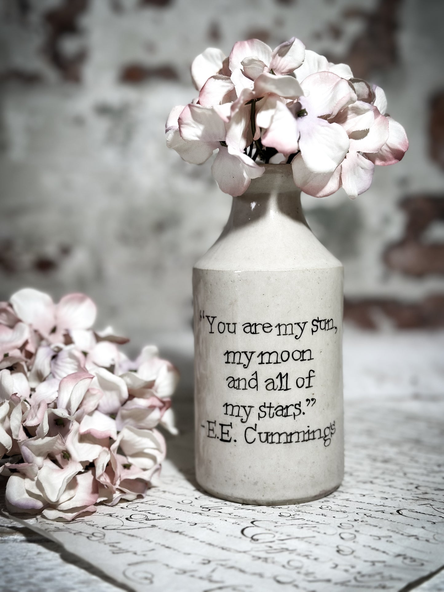 An Antique Pottery Bottle with a Hand Painted Valentine’s Day Quote