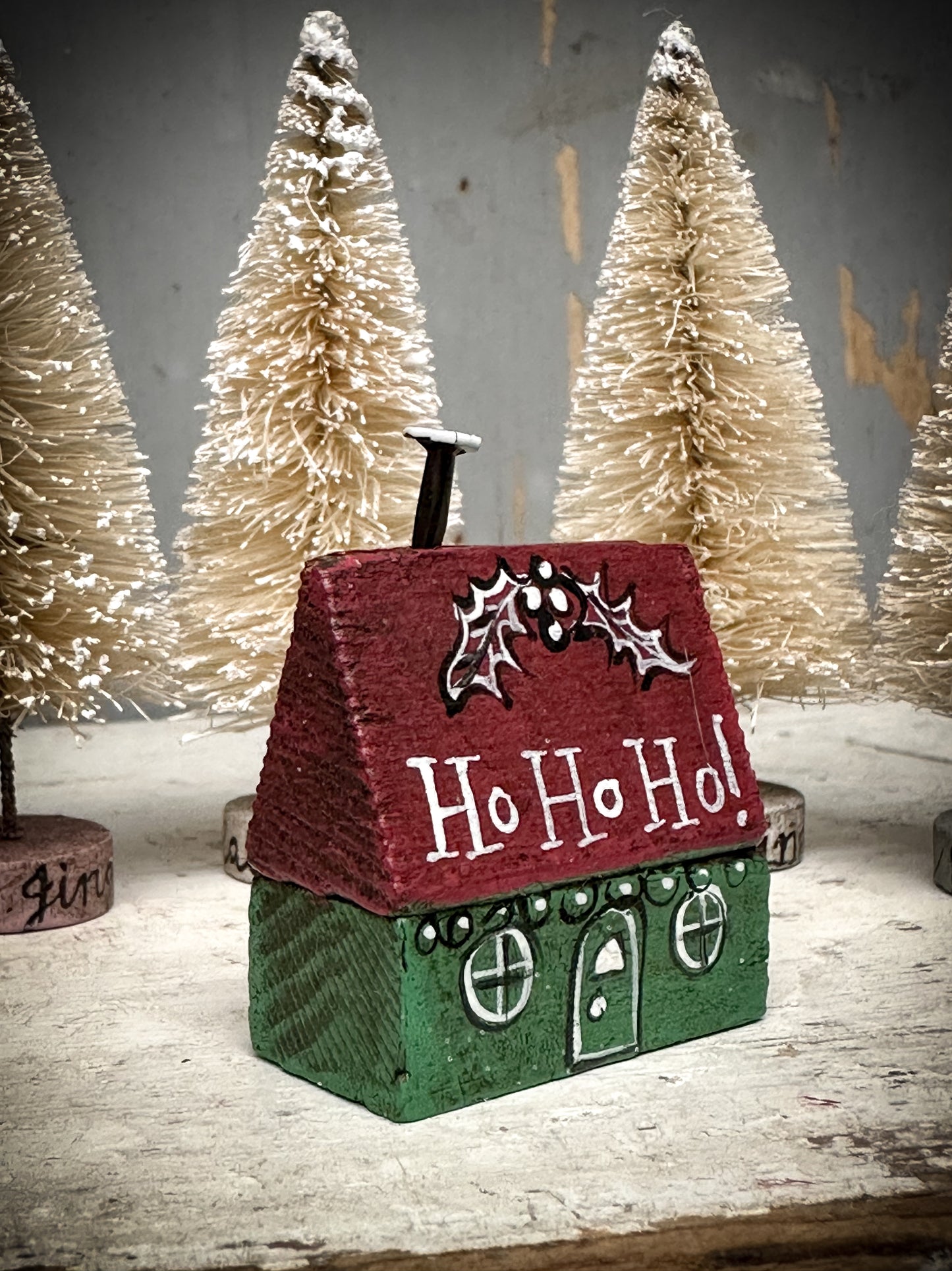 A small Vintage German Erzgebirge Putz Wooden Village House “Ho Ho Ho”