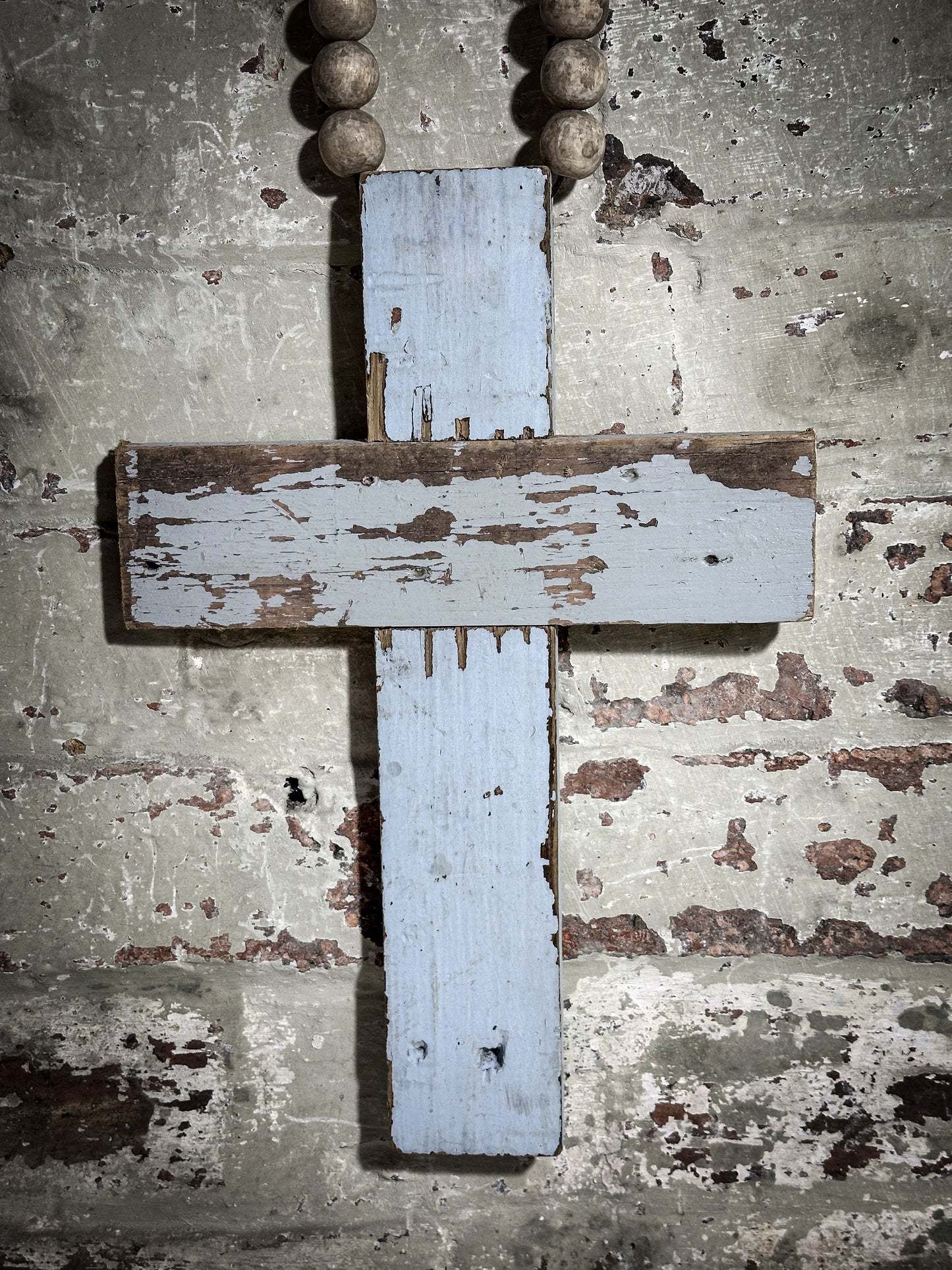 A beautiful hand made recycled wooden oversized crucifix or rosary