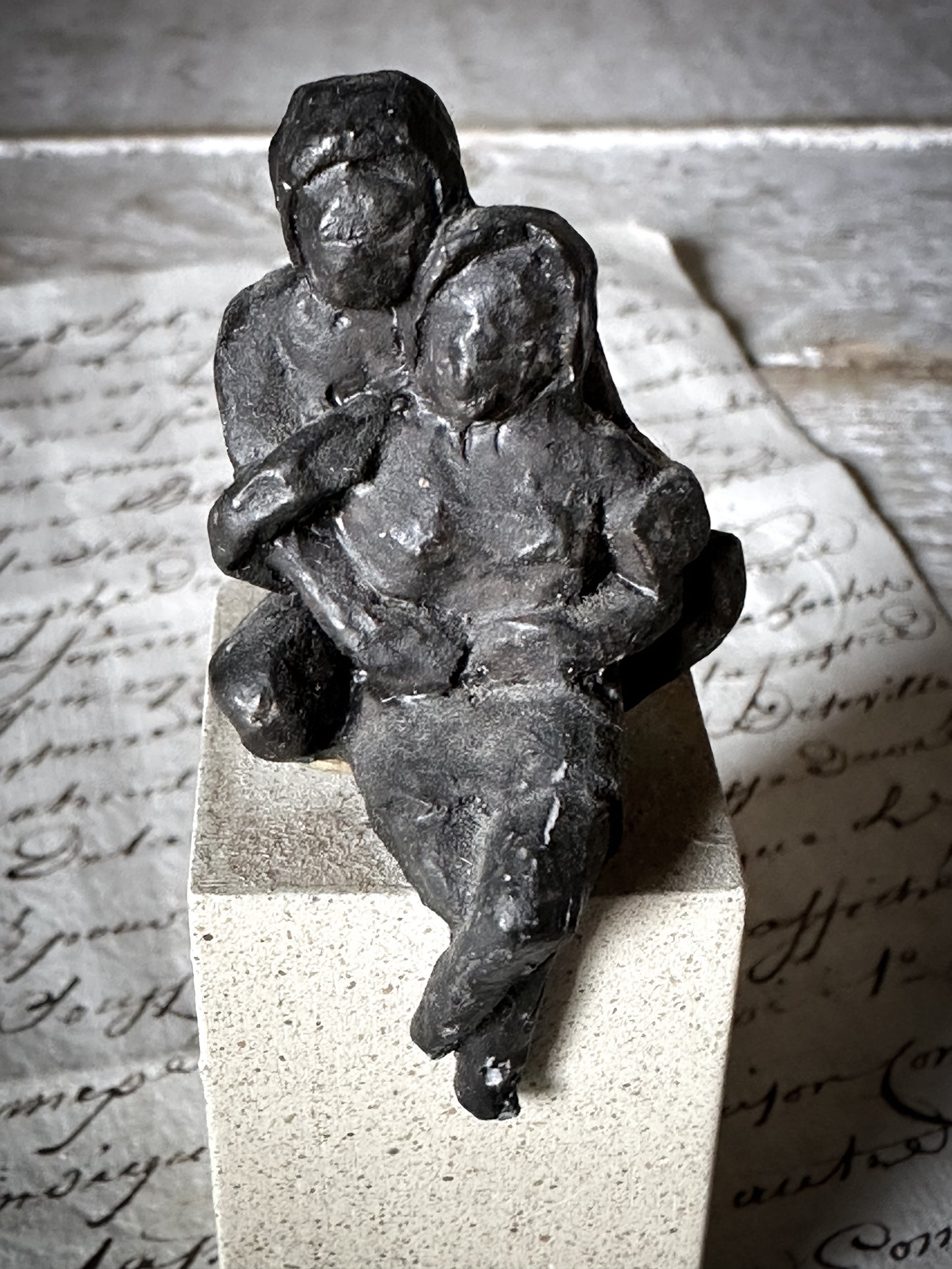 A Vintage Mini Sculpture of an Embracing Couple