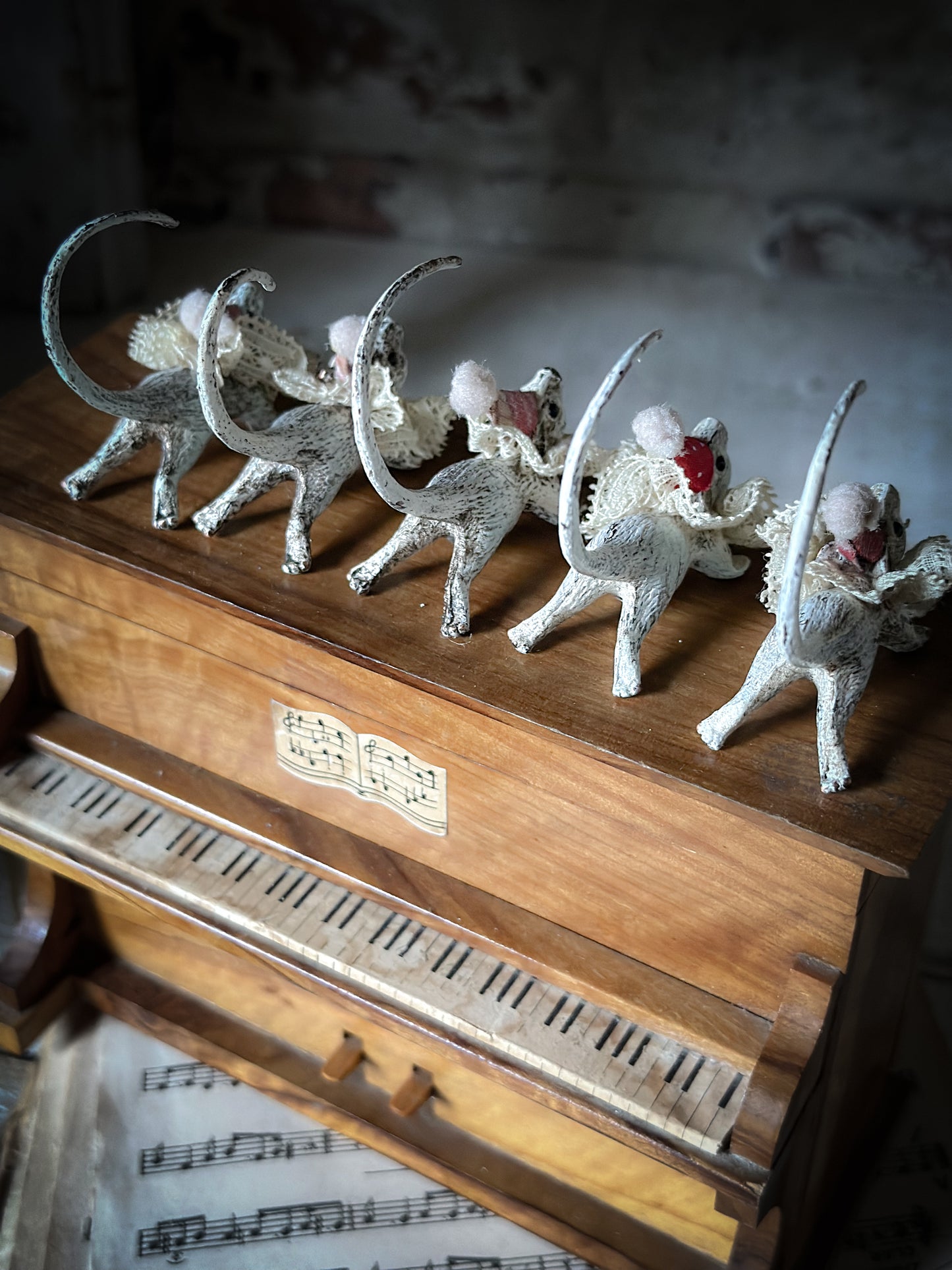 A cold painted brass “night before Christmas mouse” with a lace ruffle and Christmas hat