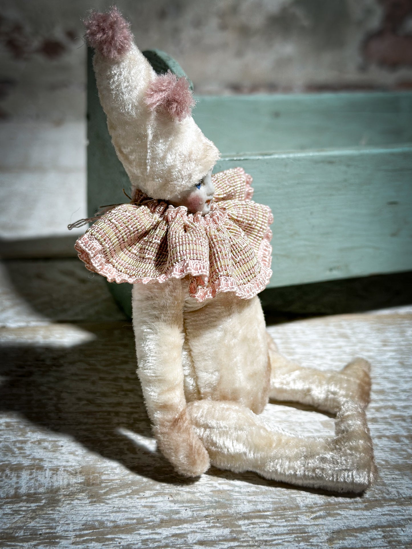 A beautiful hand made jointed collector’s doll teddy bear with bunny pyjamas