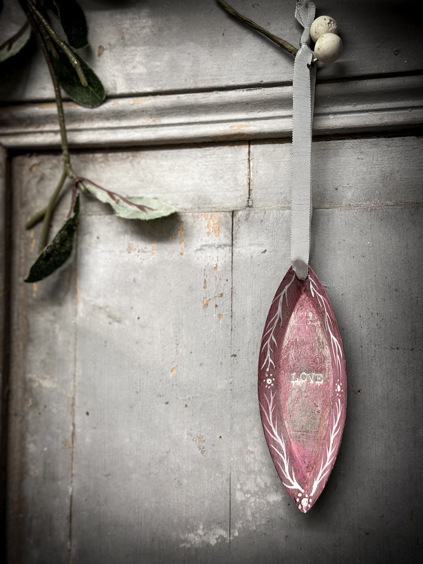 A Reworked French Patisserie Tin Christmas Decoration Stamped and Painted “love”