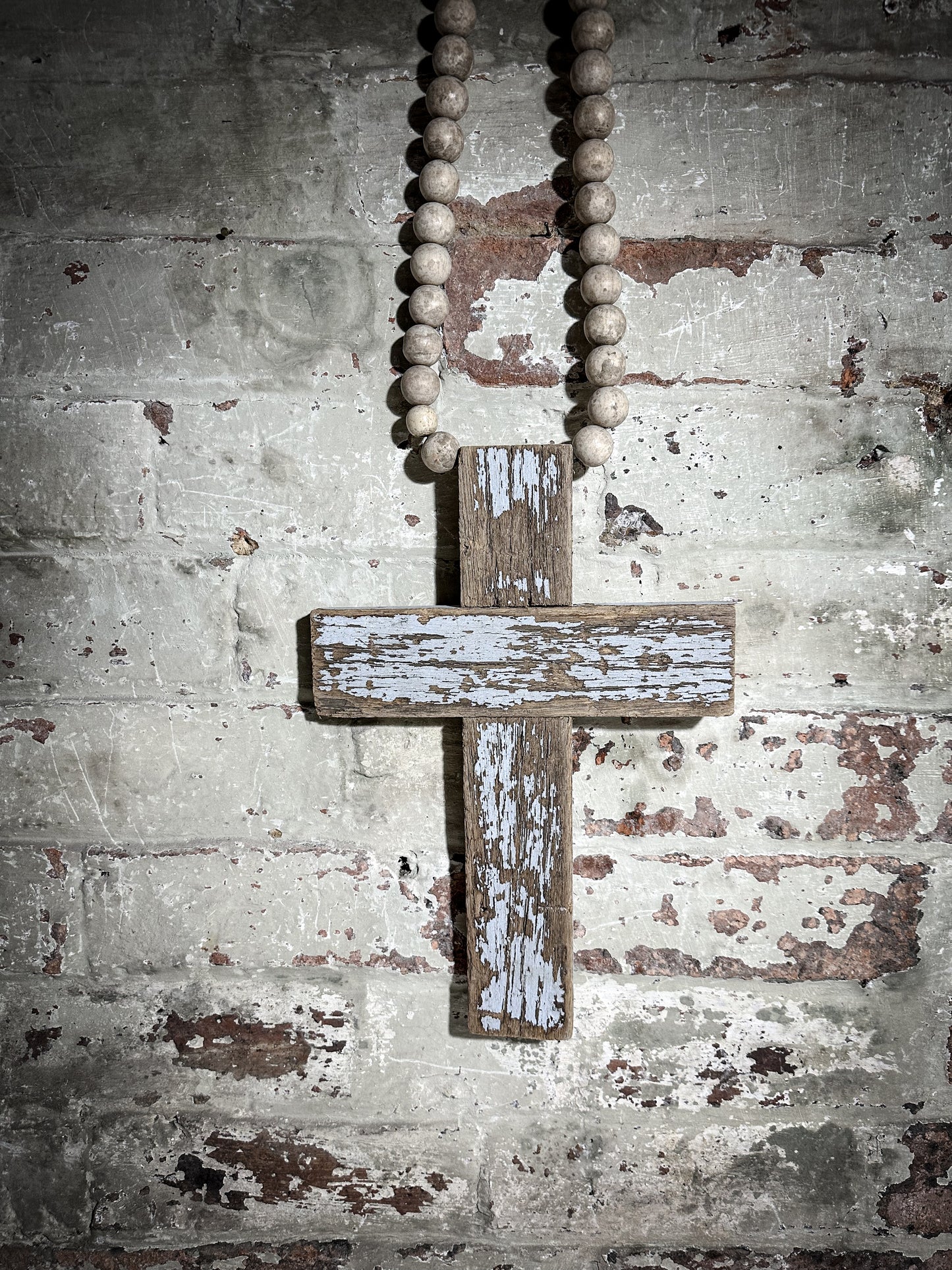 A beautiful hand made recycled wooden oversized crucifix or rosary