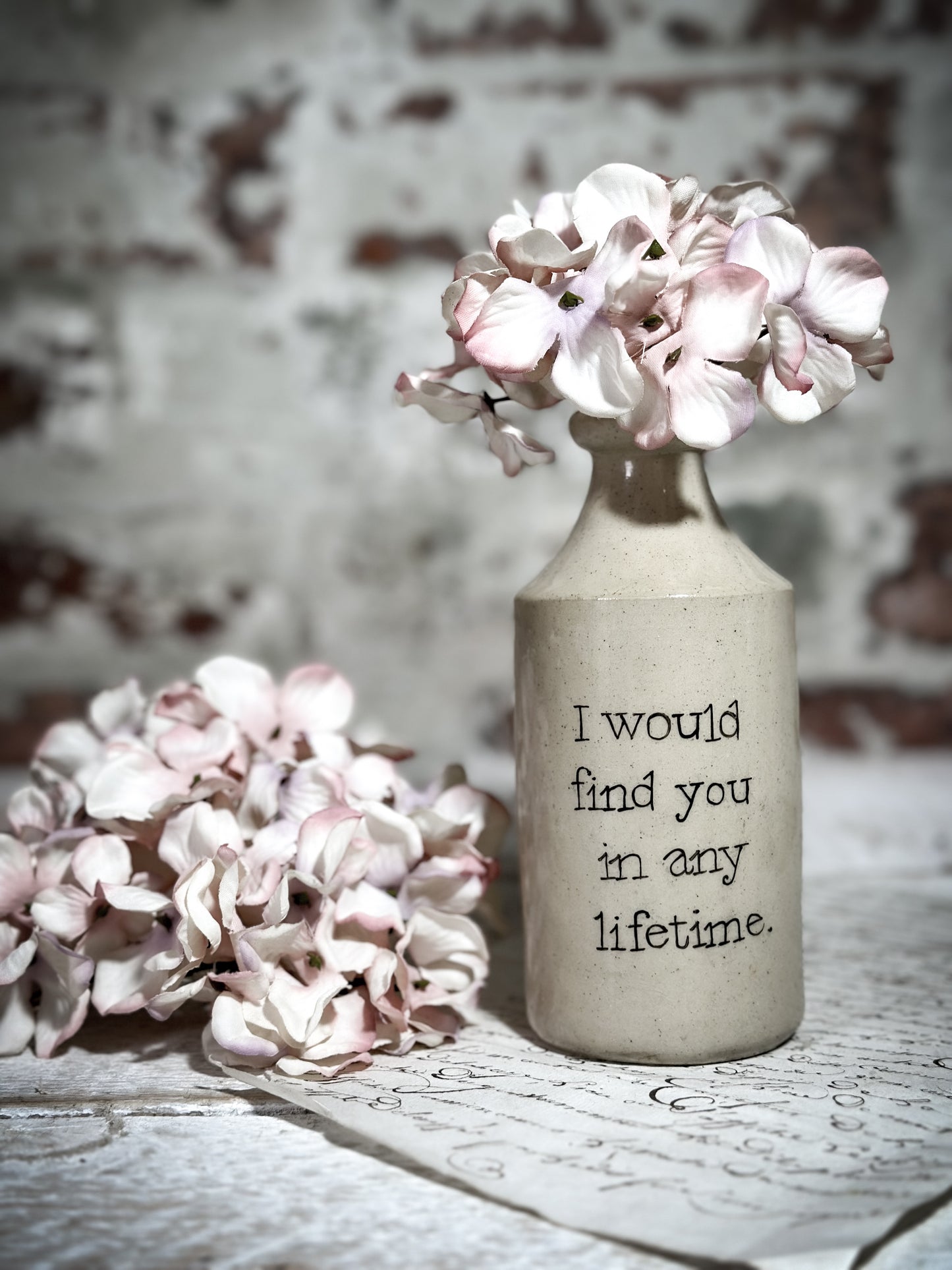 An Antique Pottery Bottle with a Hand Painted Valentine’s Day Quote