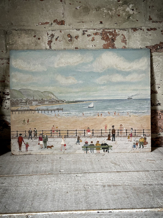 A fabulous vintage naive painting of an English seaside oil on board in the style of L.S.Lowry